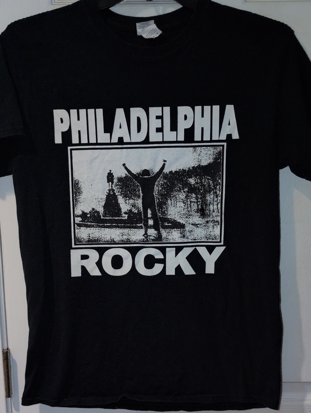 Gildan Black Tee with Blue Logo Tag